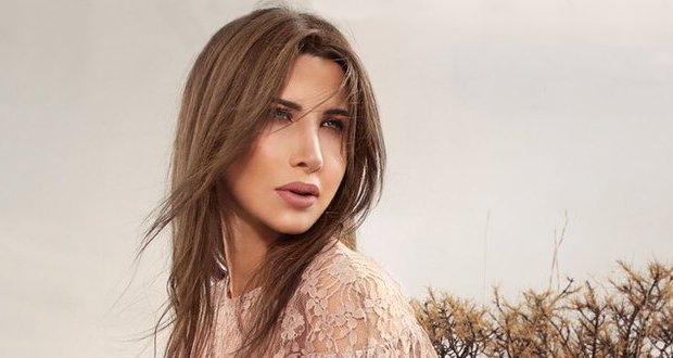 نانسي عجرم تبارك للفريقين المغربي والتونسي